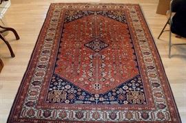 10 by 7 Mecca Heriz oriental rug.