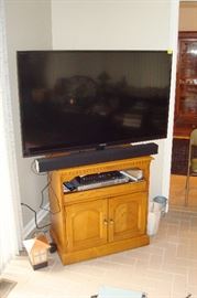 55 inch hdtv, tv stand, & vizio sound bar.