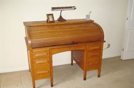 Antique oak roll top desk.