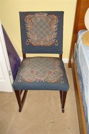 Antique needle point sewing rocker.