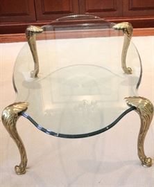 Stunning French Glass Top Coffee Table  $479
1/2 " thick glass with fluted edges all around
4 brass legs attach directly to the glass
Approx 4 ft long and 2.5 ft wide
This is a Beautiful piece of French furniture