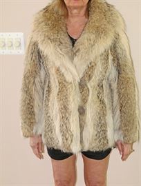 Very Warm Coyote Jacket.    $449
This Beautiful coat will keep your lady warm on the coldest Winter nights                                                          An Anne Klein Design, Made by Flemington Furs, a Top Notch Fur coat maker 
Current Summer Sale price for a similar coat at Macy's is $4,000
Size: Woman's medium 
Very Good Condition