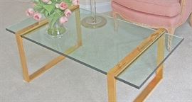 Glass coffee table with Gold plated Legs                            49" X 24 ",  glass is 1/2" thick                                                 $119