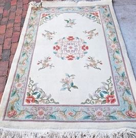 Beautiful Chinese Hand Made Area Rug      $49
wool, neutral color--Beige Background
Patterns of flowers on corners & interior
3/8 inch thick
very good condition