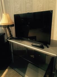 4 different flat screen TVs 