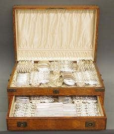 Whiting Mfg. Co. sterling silver flatware service for twelve, "Lily" pattern, circa 1903, 97 pieces, in an oak case.