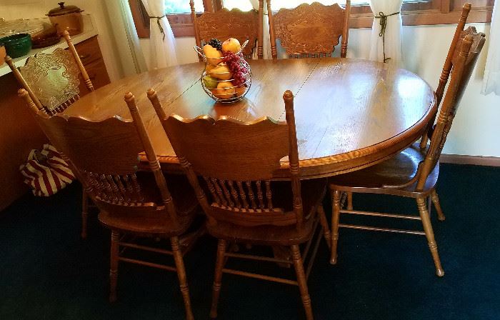Repro round oak claw foot table, leaf & six pressed back chairs
