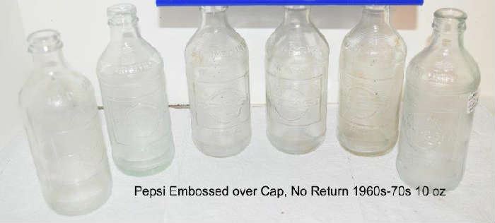 Pepsi Rd 10 oz embossed Clear Bottles  