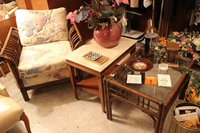 rattan furniture set including love seat, chair, and end table