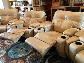 Southern Motion electronic reclining leather theater chairs, set of four