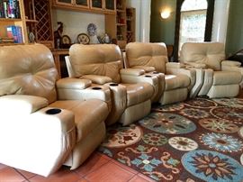 Southern Motion electronic reclining leather theater chairs, set of four