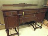 1920'S SOLID OAK SIDEBOARD / 3 DRAWERS-2 DOORS / ORIGINAL HARDWARE AND KEY / EXCELLENT CONDITION /60" WIDE - 44" TALL - 24" DEEP