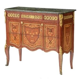French Style Veneered Commode / Chest: A French style veneered chest, having a shaped green marble top, over three drawers and decorative inlays, adorned with cast brass ormolu mounts. Circa 1980s.