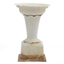 Victorian Cast Iron Planter: A large Victorian cast iron garden planter, having a foliate rim and pedestal, on a plinth base. Assembled as one piece. Unmarked. Circa 1880-1900.