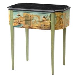 Maitland-Smith Black Marble Top Accent Table: A Maitland-Smith black marble top accent table. The green painted table base houses two drawers on slender tapered legs, having painted Venetian inspired images to the perimeter. Marked by Maitland-Smith to the inside drawer and base.