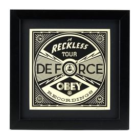 Shepard Fairey Signed Limited Edition Serigraph from "50 Shades of Black": A signed limited edition 2013 monochromatic serigraph on ivory paper, released in 2014 by well-listed and world-renowned American street artist Shepard Fairey (born 1970). The print is titled A Reckless Tour de Farce and was released with the artist’s 50 Shades of Black Box Set. The set featured fifty designs for vinyl record covers, and were originally released together in a hand-crafted screenprinted box. This print depicts the piece’s title printed within a geometric circular design. The print is signed, dated 2013, and numbered 94/200 in pencil to the lower corners. The print is matted in black and presented behind glass in a black composite frame with a hanging wire to the verso.