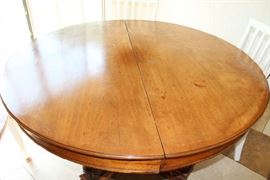 Top of Kitchen / Dining Room Wood Table with Intricate Carved Fish for Legs and Four Chairs (includes two large leaves not shown)