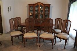 Dining Room Hutch with Table and Six Cane Back Chairs
