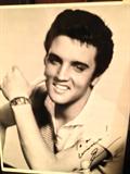 Early photo copy of Elvis with signature.
