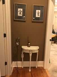 62		1/2 round white painted table on legs 21x11x28	 $75.00 
