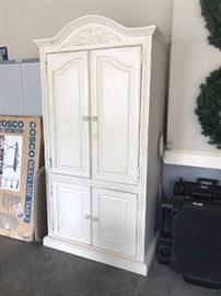 83		cream painted entertainment ctr 37.5x21x 78	 $75.00 
