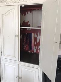 83		cream painted entertainment ctr 37.5x21x 78	 $75.00 
