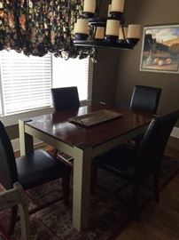 #54 Dining table with 4 leather look Chairs $200
