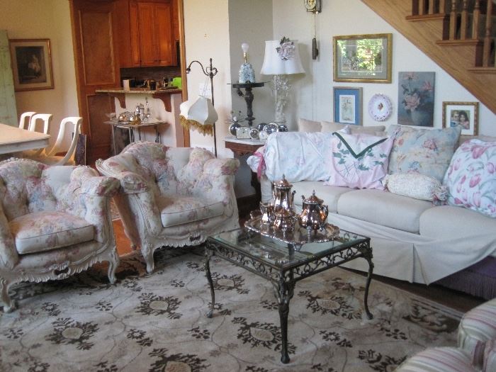 Shabby chic furnishings and accessories. Purple velvet couch base is covered by slipcover