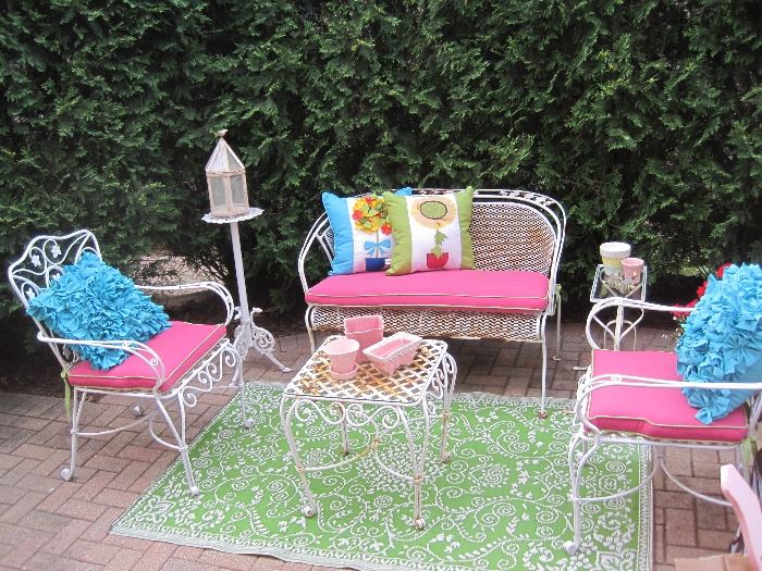 Vintage patio furniture with fancy cushions!! More not shown