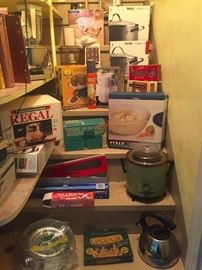 Kitchen items - many in original boxes, some never been used.  She didn't really enjoy cooking!