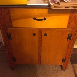 Another wood cabinet in laundry room - solid and in great shape