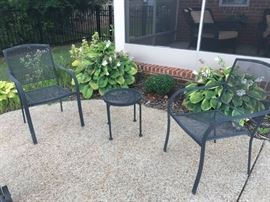 #52 (2) metal patio chairs $30 ea.