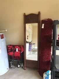 #56 Wicker floor mirror 19"x69" $35
#55 red fold up wagon $25
#35 5x8 red rug $40