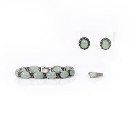 Sterling Silver and Jade Bracelet, Ring, and Earring Set: A sterling silver and jade bracelet, ring, and earring set.