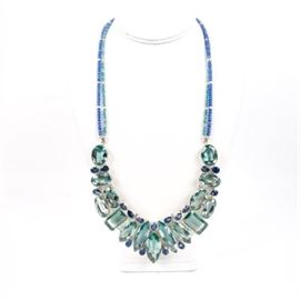 Sterling Silver Aqua Teal Clear Faceted Gem Necklace: A sterling silver aqua teal clear faceted gem necklace. This necklace has light blue and teal faceted beads with two strands of matching small beads.