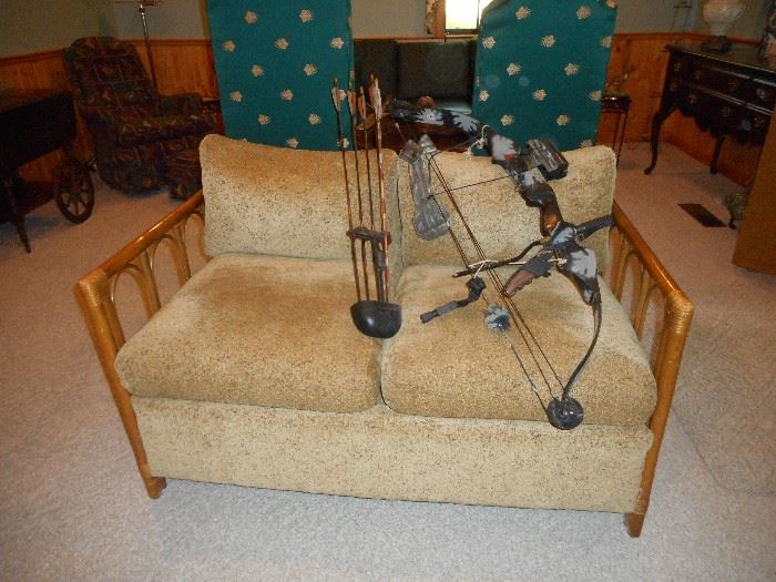 Rattan Upholstered Love seat / Polaris Compound Bow with arrows & quiver