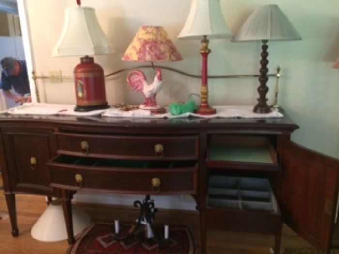 lamps, sideboard with brass gallery and tinned lined drink drawer