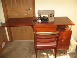 White sewing machine. Works great.