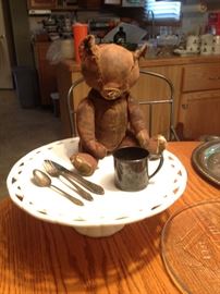 Adorable Teddy Bear (leather) Mohair is worn off, had a crier and has excelsior stuffing; silverplate child's cup and flatware
