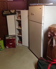 Frigidaire Refrigerator (works great and is super clean); White laminate storage cabinet; Christmas Tree in Box!