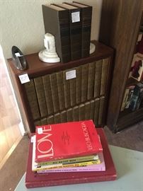 Encycopedia set, book case (one of several in that room) marble book ends, first editions and adult reading