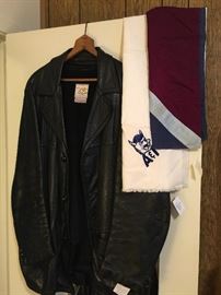 a leather headcrack jacket and flight scarves