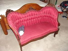 Antique tufted mahogany carved settee