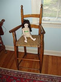 Antique chair and doll
