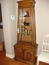 Wood and glass curio with Memphis Carnival objects