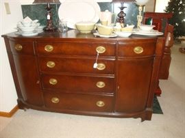 Buffet, dinnerware, table lamps, pillar mantle clock (not shown)