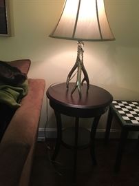 WOOD ACCENT TABLE, $25 and a white metal antler lamp. $35