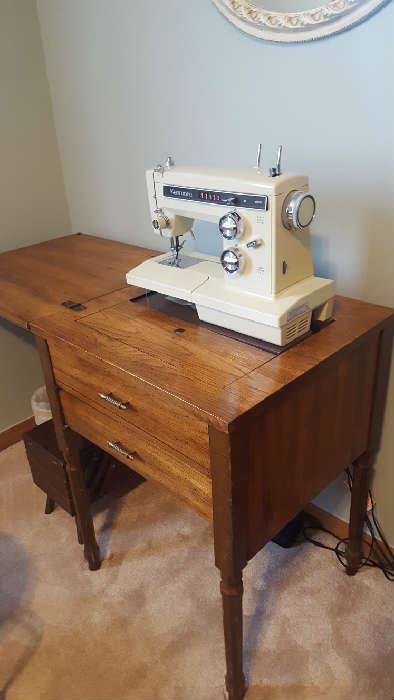 Sewing machine and cabinet -$75