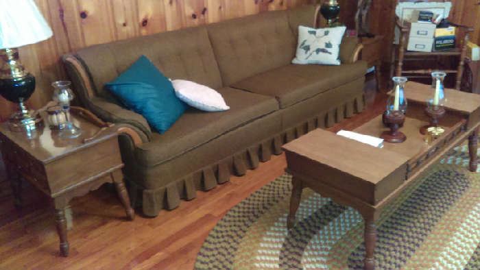 neutral color ruffle edge sofa has no rips or tears and is in great condition $100 solid wood rocking chair $130 end table $50, pair of beautiful hurricane lamps $20