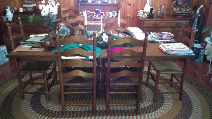 beautiful dining room table with 8 ladder back chairs available Table $380, ladder back rush bottom chairs are $80 each, 2 buffets/sideboards are available $210 each